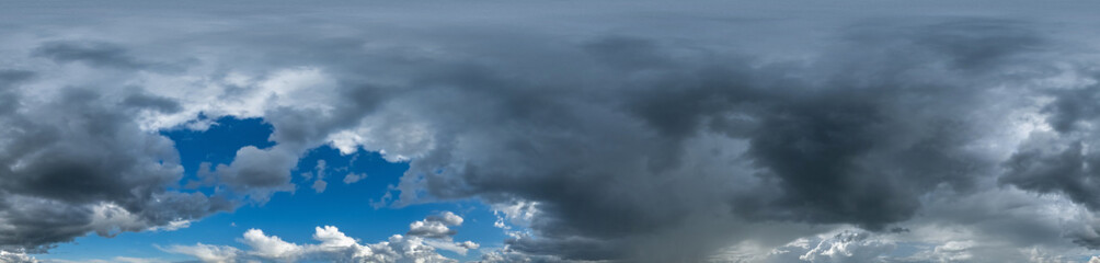 seamless hdri 360 panorama of dark blue sky before sunset with awesome storm clouds for use in 3d...
