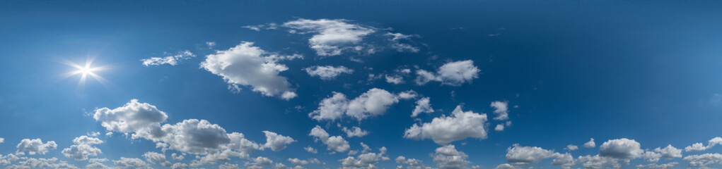 blue sky with beautiful cumulus clouds. Seamless hdri panorama 360 degrees angle view with zenith...