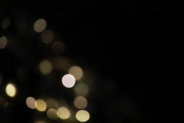 Abstract Bokeh Light Background with Defocused Circular Highlights and Dark Contrast