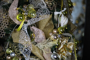 Elegant Vintage Christmas Tree with Gold and White Ornaments and Delicate Lace Decorations