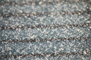 Close-Up of Frost Covered Surface with Parallel Lines