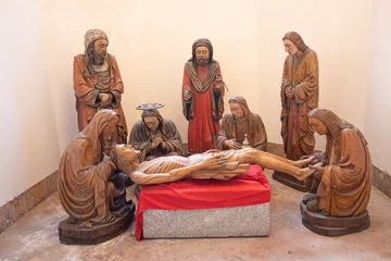 Selbstklebende Fototapeten LODI, ITALY - MAY 21, 2025: The carved polychrome sculptural group - Compianto sul Cristo morto - Lamentation over the Dead Christ by unknown artist (cca 1400–1430). © Renáta Sedmáková
