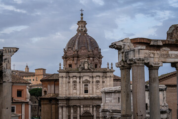 Rome, Italy: The ancient Roman forum with ancient temples and catholic churches in Rome, Italy capital city.