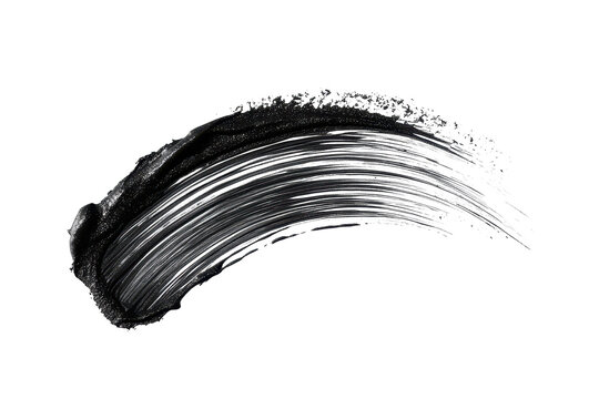 Makeup brush stroke of mascara isolated on white background showcasing a sleek application technique for dramatic eye enhancement
