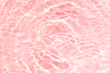 Pink water bubbles on the surface ripples. Defocus blurred transparent pink colored clear calm...