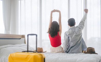 Joyful moments asian happy couple travel in love summer holidays trip prepare trip at home