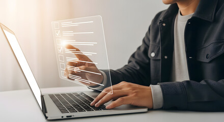 Man Typing on Laptop with Virtual Interface