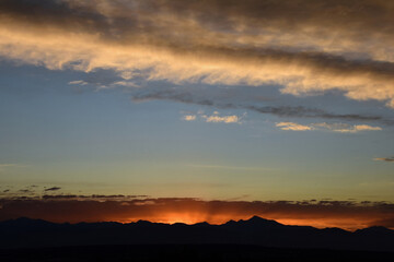 colorful Summer sunset over  long's peak and the front range of the  Rocky Mountains of colorado, as seen from Broomfield 