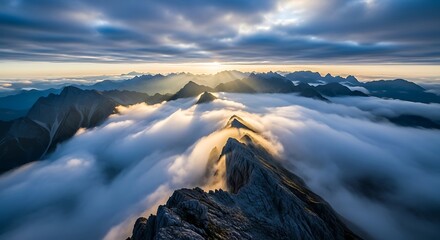 Aerial View of Mountain Peaks Emerging from Cloud Inversion
