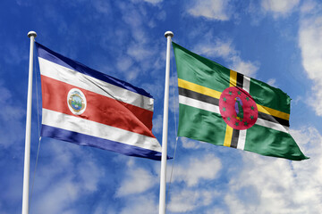 3D illustration. Costa Rica and Dominica flags waving in the sky. High detailed waving flag. 3D render. Flags fluttered in the cloudy sky, symbolizing diplomatic relations.