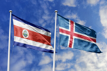 Costa Rica and Iceland flags waving, symbolizing unity. Red, white, blue meets blue with red cross,...
