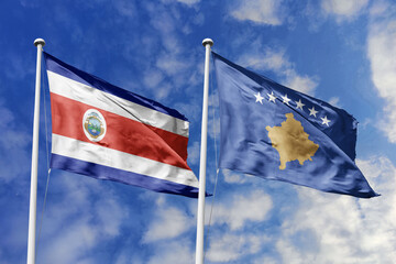 Waving flags of Costa Rica and Kosovo against a vibrant blue sky, symbolizing international...
