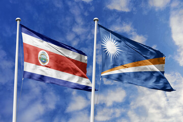 Costa Rica and Marshall Islands flags proudly waving against a vibrant blue sky, symbolizing...