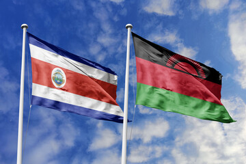 Costa Rica and Malawi flags proudly waving against a vibrant blue sky, symbolizing international...