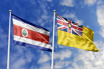 Costa Rica and Niue flags proudly waving against a vibrant blue sky, symbolizing international relations, friendship, and diplomacy between the two nations.