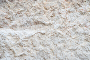 Close-Up of Natural Stone Texture with Soft Beige and White Tones