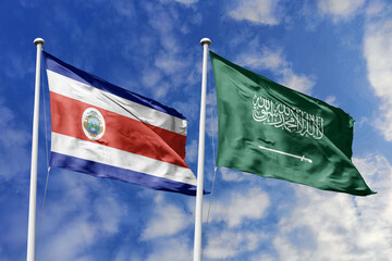 Costa Rica and Saudi Arabia National Flags Waving Harmoniously Under a Bright Blue Sky, Symbolizing Diplomatic Relations and Global Connections.