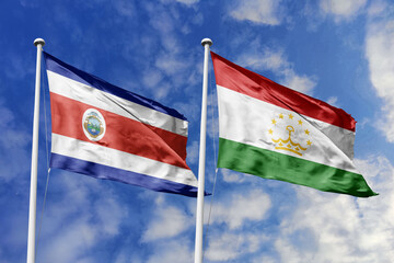 Flags of Costa Rica and Tajikistan Waving Gracefully Under a Clear Blue Sky, Symbolizing Diplomatic Relations and Central Asian Connections.