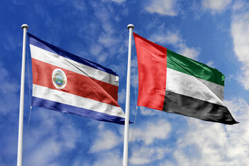 Flags of Costa Rica and the United Arab Emirates Waving Against a Vibrant Blue Sky, Symbolizing Diplomatic and Economic Partnership