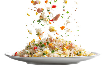 Fried rice with vegetables and meat ingredients flying above the plate isolated on transparent background
