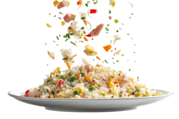 Fried rice with vegetables and meat ingredients flying above the plate isolated on transparent background