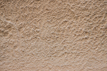 Beige Rough Textured Wall Surface with Abstract Pattern Background