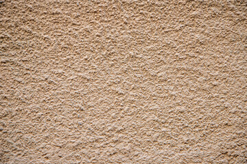 Beige Rough Textured Wall Surface with Abstract Pattern Background