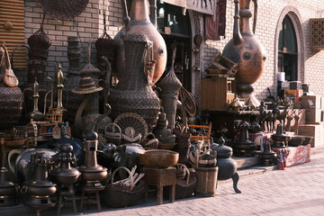 In Kashgar Ancient Town, Xinjiang, traditional handicrafts like woven wares and copper items...
