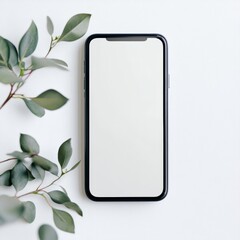 Smartphone with blank screen and green branches on white background