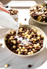 chocolate cereal flakes balls with milk