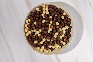 chocolate cereal flakes balls with milk