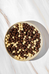 chocolate cereal flakes balls with milk