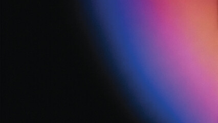 Obraz premium Abstract motion of colorful rainbow light rays on a dark background