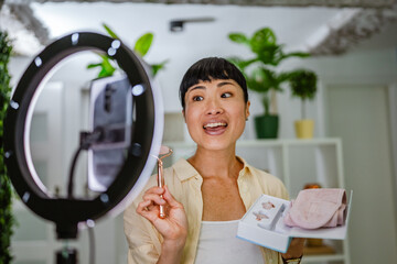 Japanese woman live streaming and show natural jade stone roller