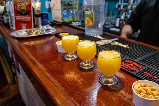 Madeira, Portugal - June 10, 2024: Traditional poncha drinks in a Bar Zeca in Santana, Madeira island