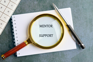 A conceptual phrase on the topic of business MENTOR SUPPORT. BUSINESS EDUCATION TRAINING COACHING...