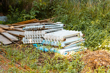 old cast iron batteries lie on the ground. High quality photo