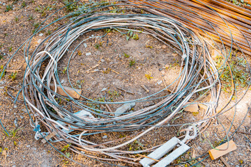 Stack of galvanized wires on the ground. High quality photo