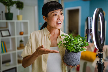 Working online female japanese influence on social media concept