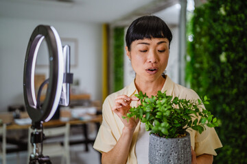 Working online female japanese influence on social media concept