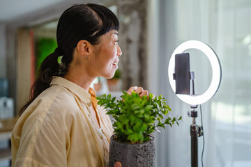 Working online female japanese influence on social media concept