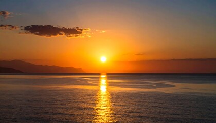 Fototapeta premium Golden Sunset over Calm Sea.