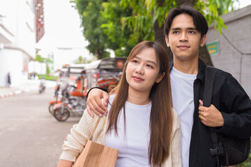 happy young couple on the street