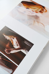 the pages of a photo book with wedding photos. 