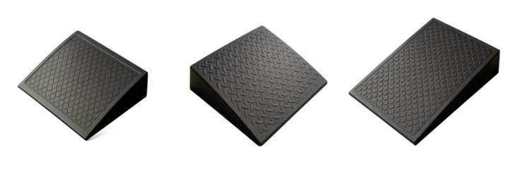 Set of black curb ramp plates with classic metal textures and subtle lighting on transparent background