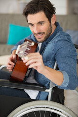 a handicapped man is a guitarist