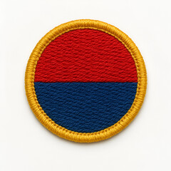 Circular Embroidered Patch with Red and Blue Halves and Golden-Yellow Border – Dense Textured Stitching, Bold Color Contrast, Textile Badge Isolated on Neutral Background