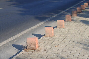 Gray curb on background of flowers, minimalism, path in the park, 7