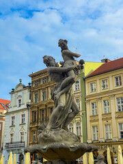 Fototapeta premium Stone sculptures in the historic center of Poznań, Poland. Classical and baroque style statues decorating the architecture of the old town. 