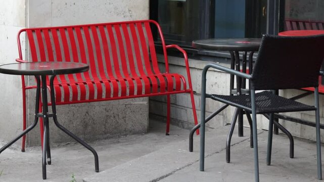 small round tables and chair with bench in street cafe